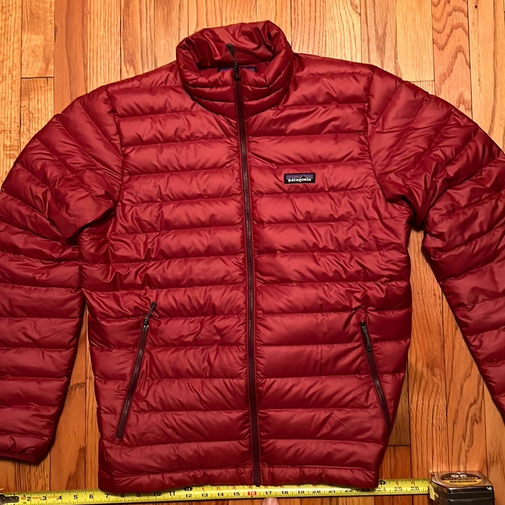 Patagonia Mens down jacket.  Worn once.   Color is red Size Medium